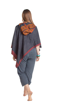 Thumbnail for A poncho with hood for men and women worn for retreats, meditation or fun.