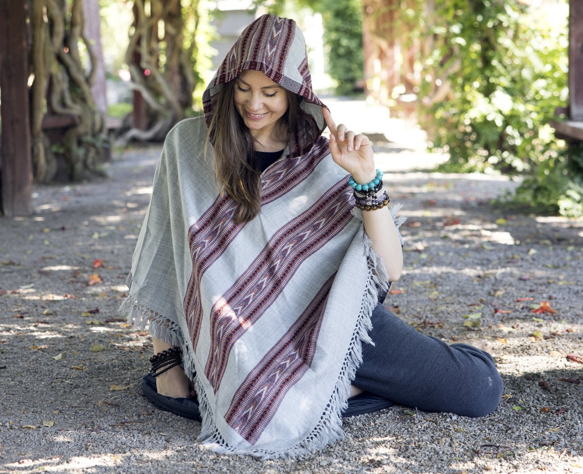 A poncho with hood for men and women worn for retreats, meditation or fun.